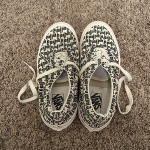 These are Vans x Fear of god. They have white with black wording over it.
